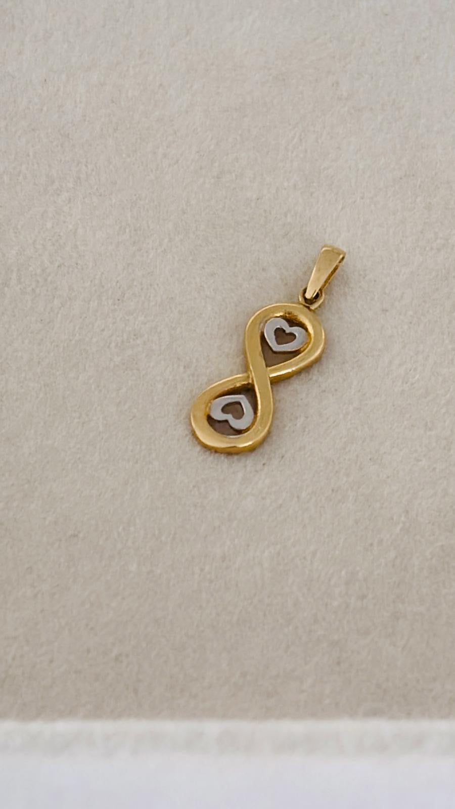Dije Infinity  en dos oros 14k