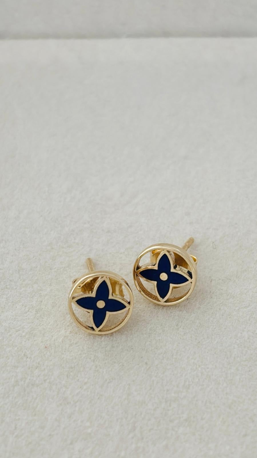 Aretes flor de color azul 10k