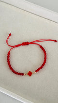 Pulsera de Hilo rojo y flor clover 14k