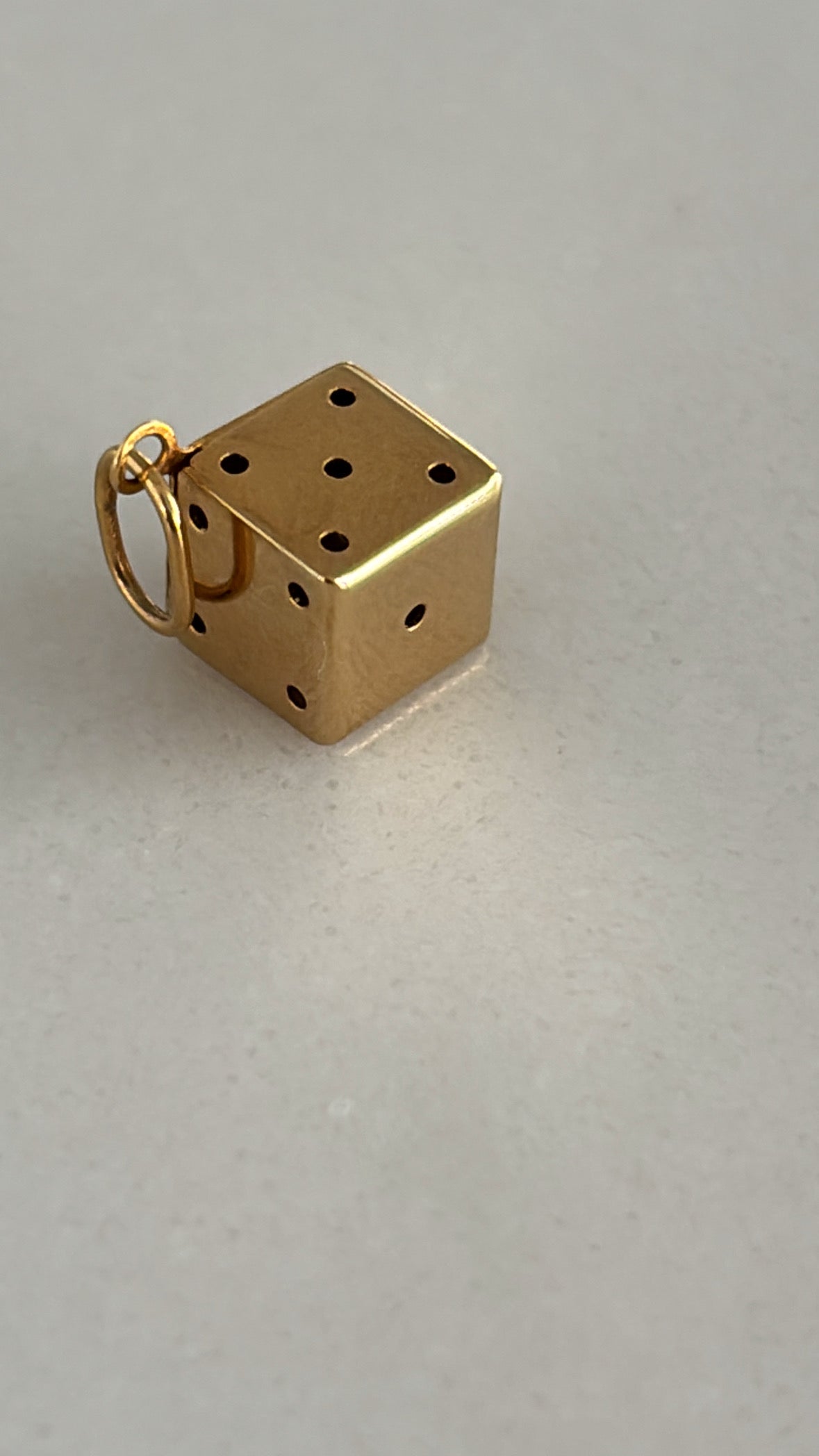 Dije dado 14k