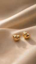 Aretes de corazón inflado 14k