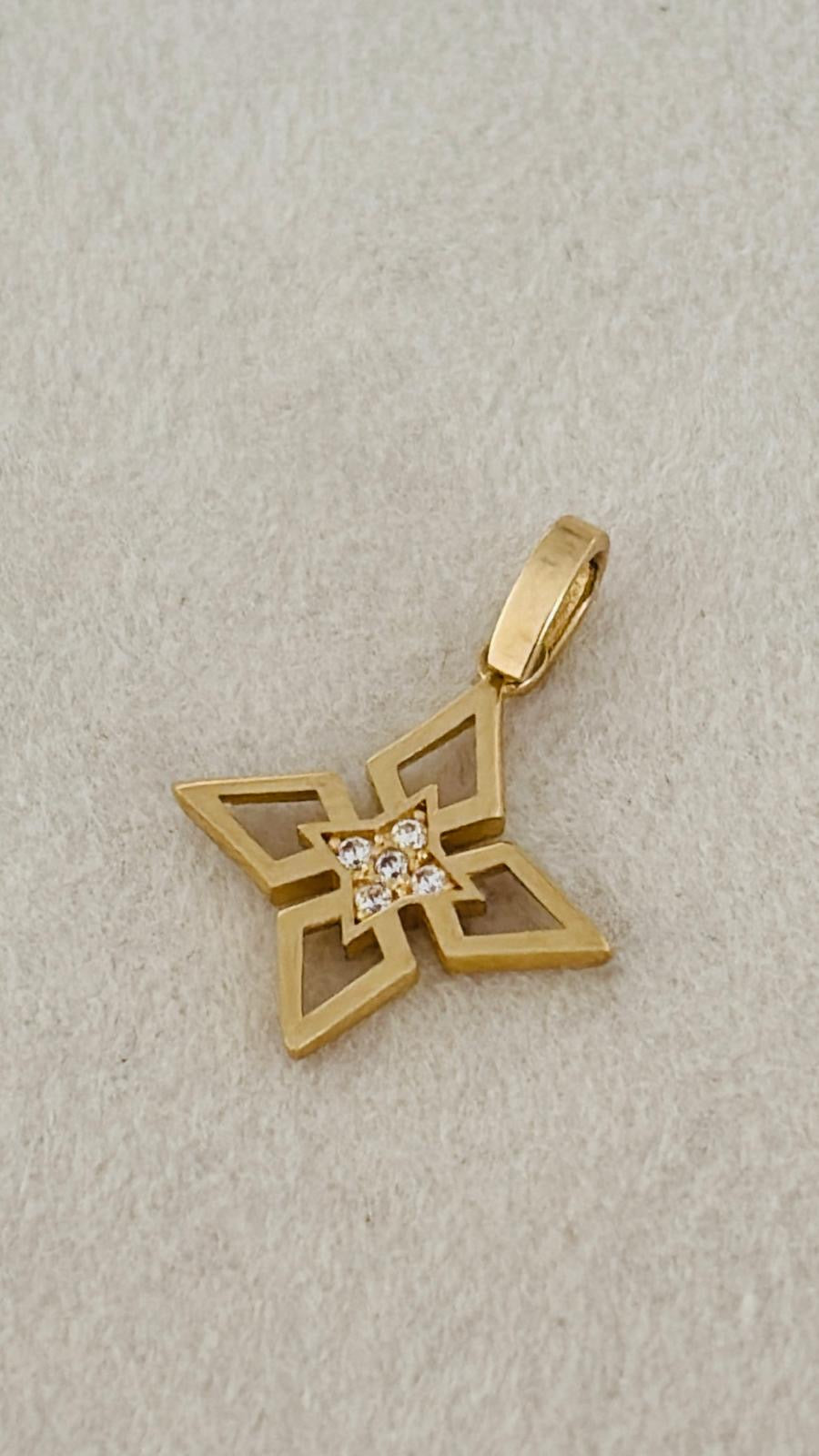 Dije de flor 14k